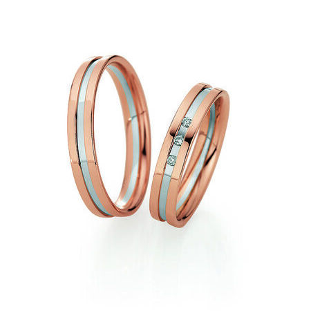 Zweifarbige Ringe aus Roségold und Silber von Light vor weißem Hintergrund