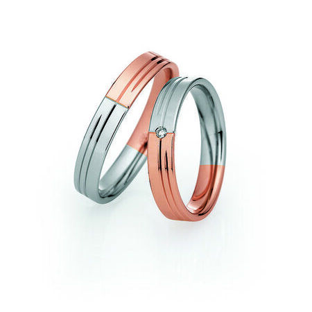 Zweifarbige Ringe aus Roségold und Silber von Light vor weißem Hintergrund