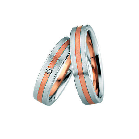 Zweifarbige Ringe aus Roségold und Silber von Steel and Gold vor weißem Hintergrund