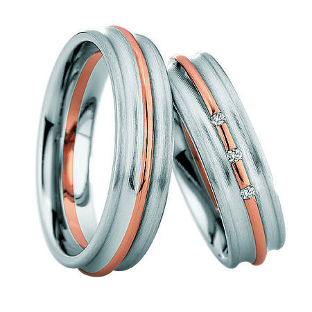 Zweifarbige Ringe aus Roségold und Silber von Steel and Gold vor weißem Hintergrund