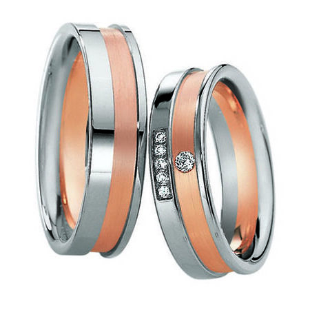 Zweifarbige Ringe aus Roségold und Silber von Eternity auf weißem Hintergrund