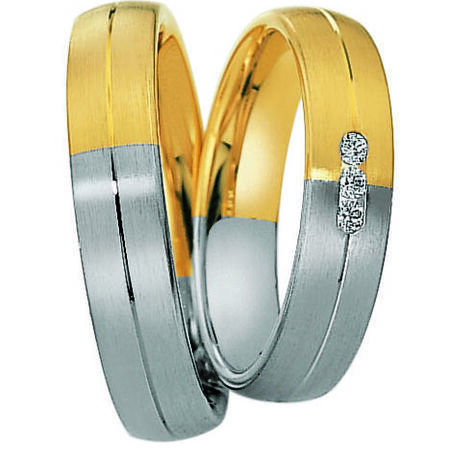 Zweifarbige Ringe aus Gold und Silber von Eternity auf weißem Hintergrund