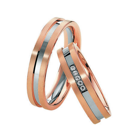Zweifarbige Ringe aus Roségold und Silber von Eternity auf weißem Hintergrund